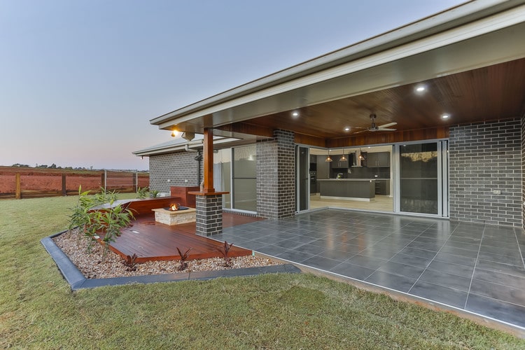 Outdoor patio area with slate grey tiles