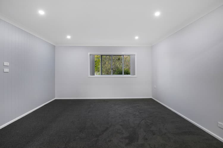 White room with grey carpets