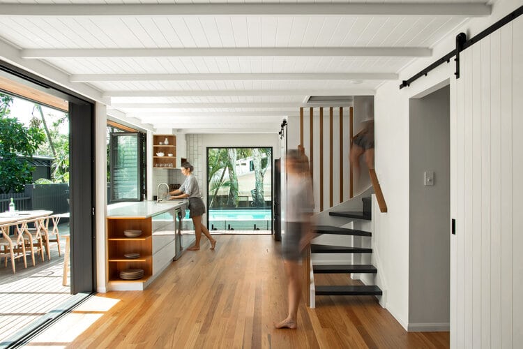 Kitchen area with timber floors and stairs