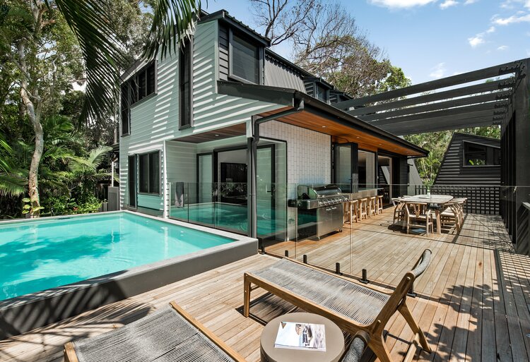 Modern home with pool and patio area