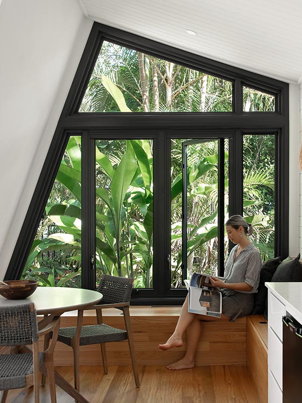 Indoor alcove with white walls and timber floors