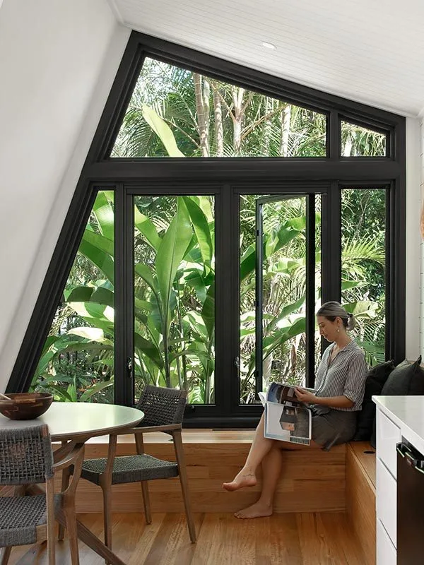 Indoor alcove with white walls and timber floors