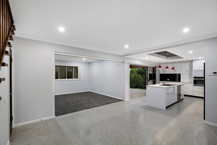 Indoor white kitchen area open living area