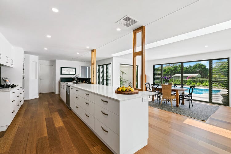 White kitchen and timber floors