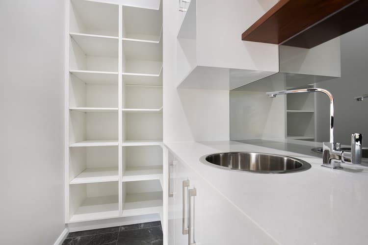 White bathroom and cupboards