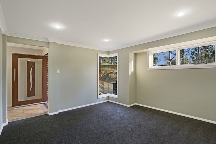 Grey room with high window and corner window
