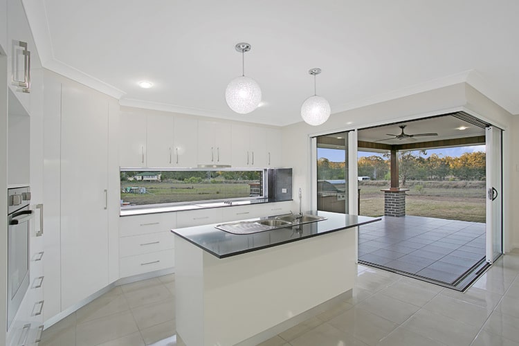 White kitchen and outdoor area