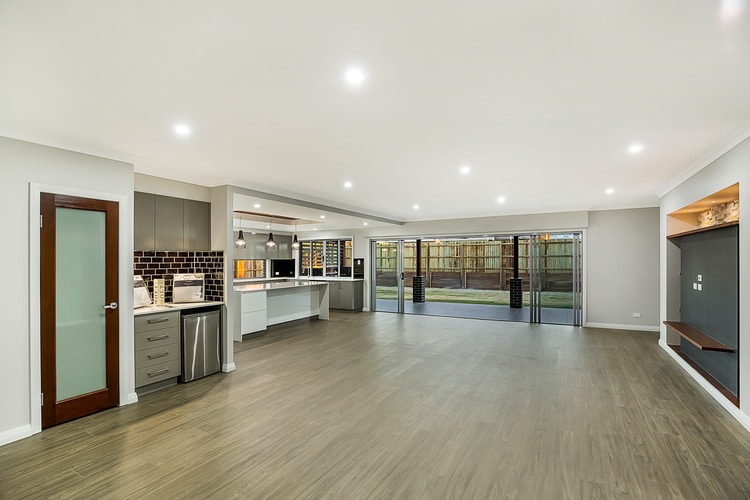 Indoor image inside newly built house by Toowoomba Builder featuring lounge and kitchen